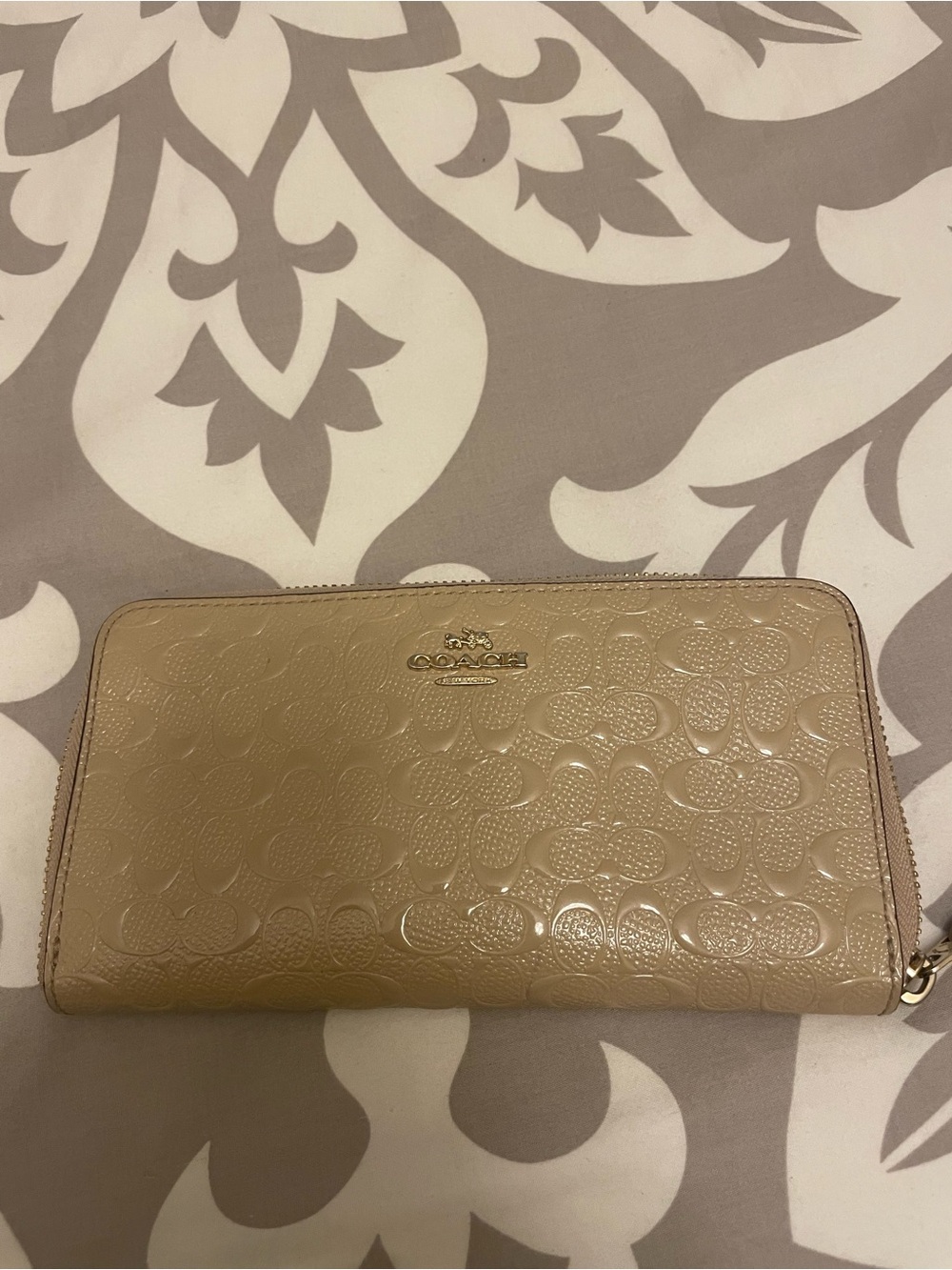 Coach Embossed Signature Zip Wallet in Beige